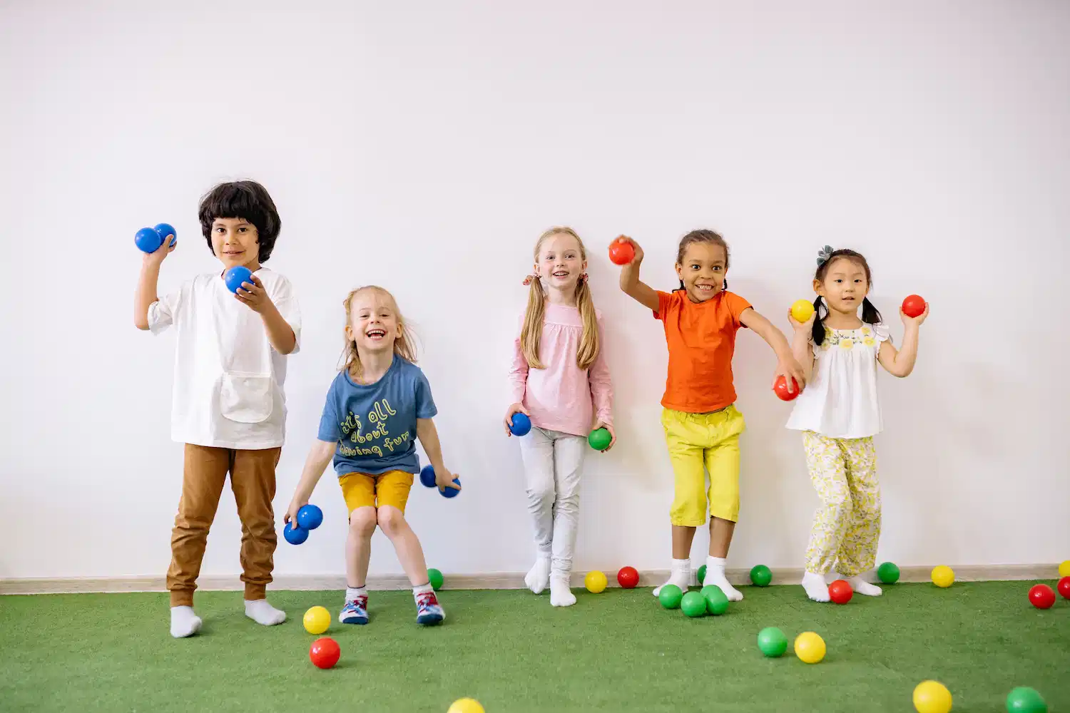Children playing with a ball pit at a party